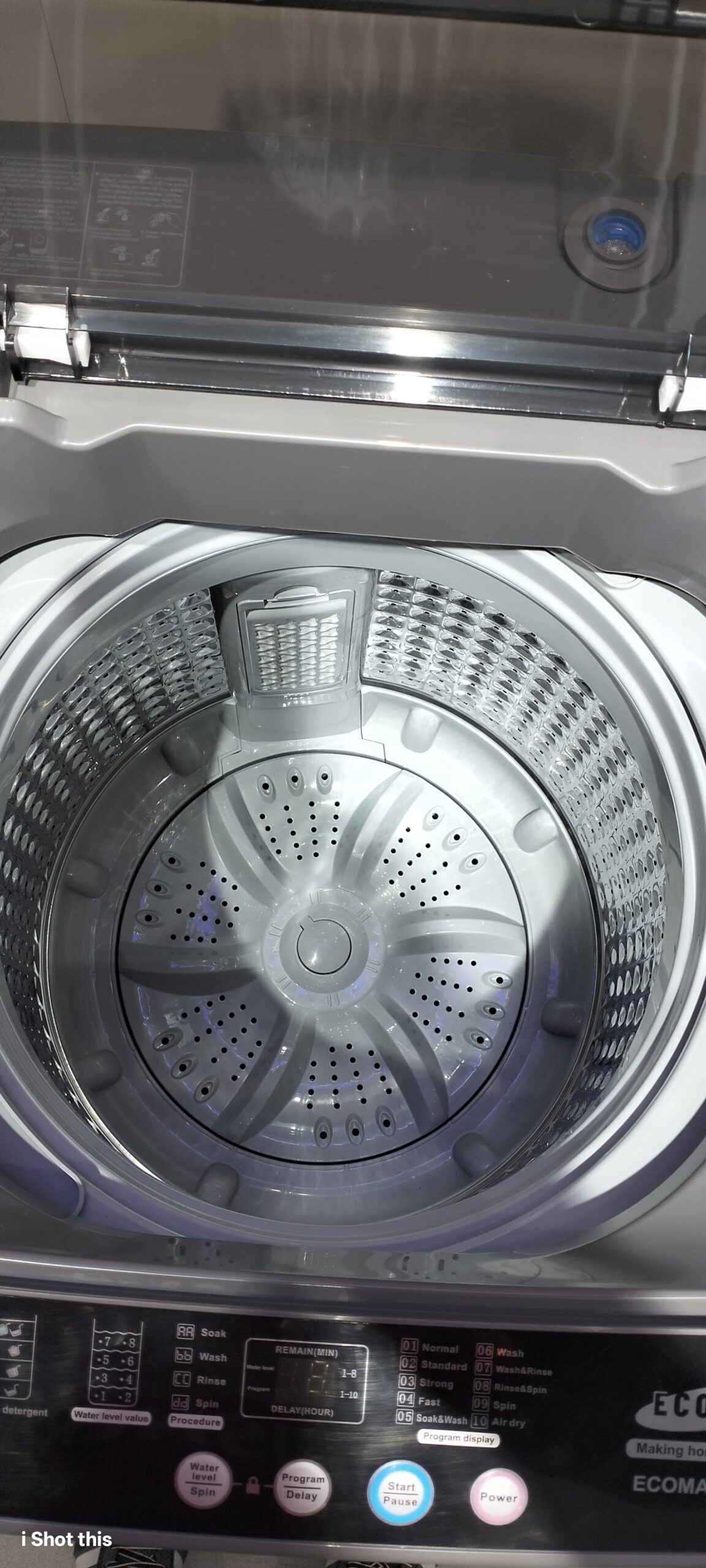 Interior view of Ecomax 7kg washing machine showing the high-grade stainless steel diamond drum and pulsator.