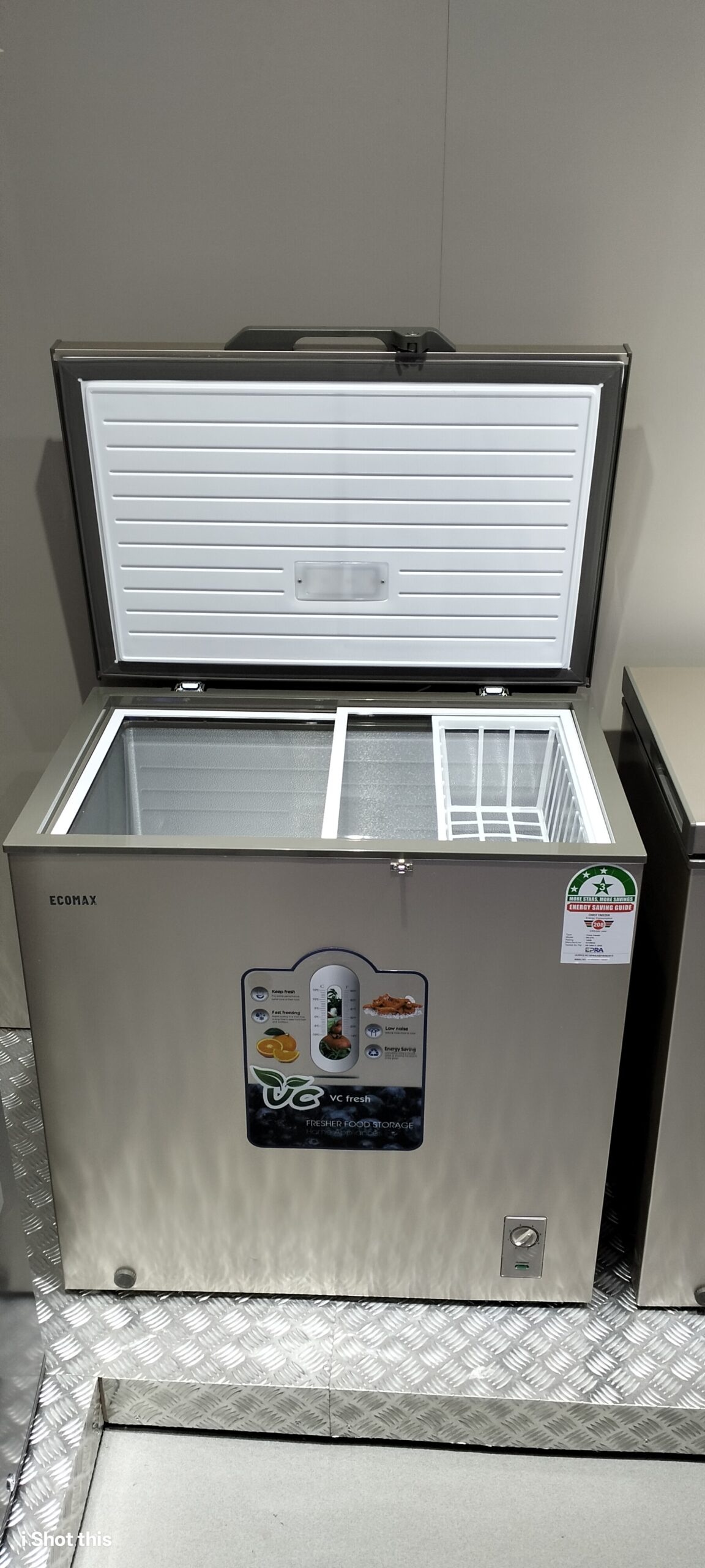 Open view of Ecomax BD-219 freezer showing internal LED light, sliding glass lid, and hanging wire basket