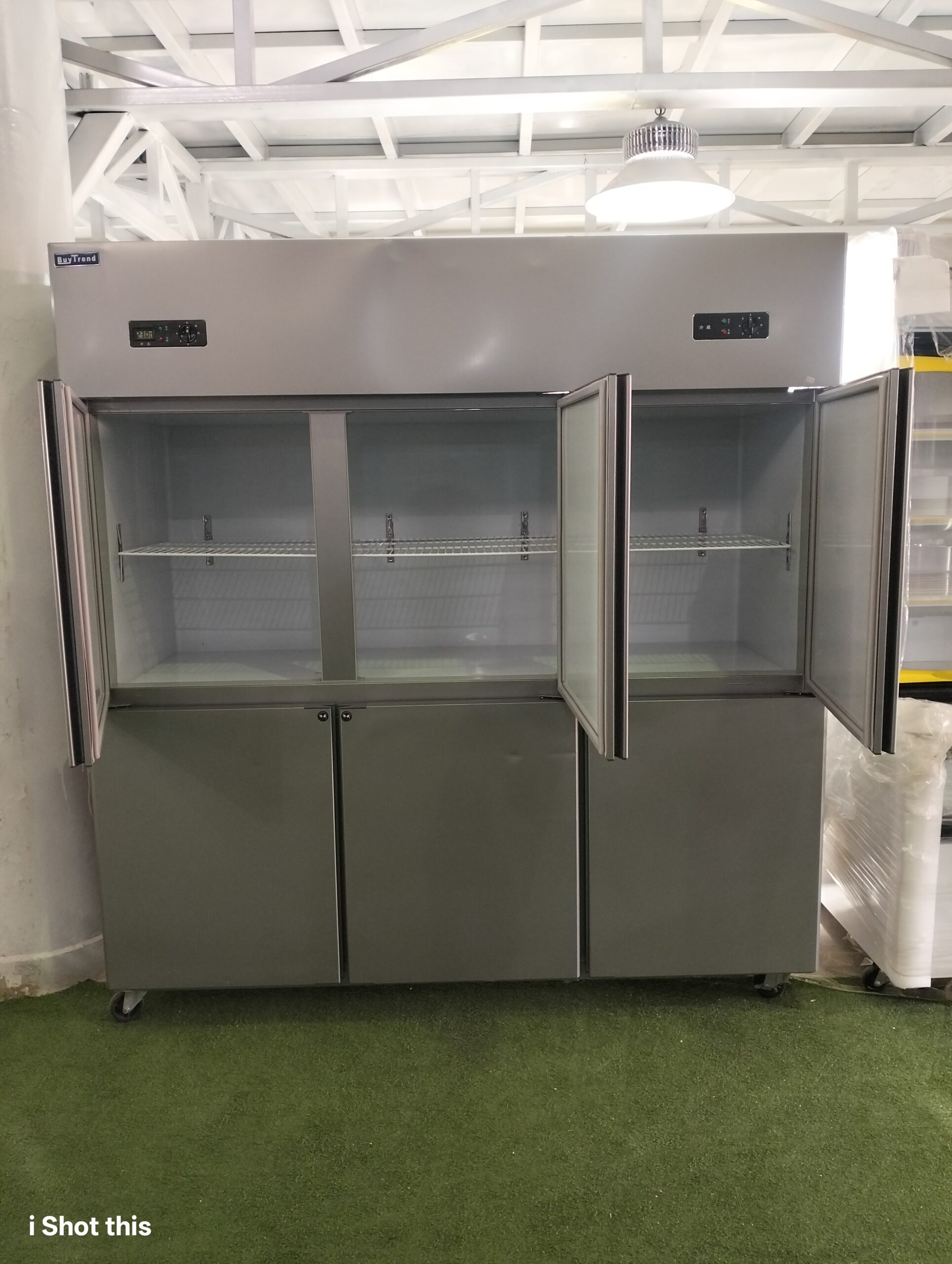 Six door fridge freezer with chiller doors open showing shelving